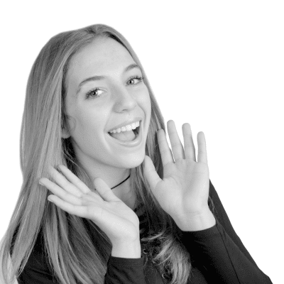 Young girl with hands up and smiling about facial harmony